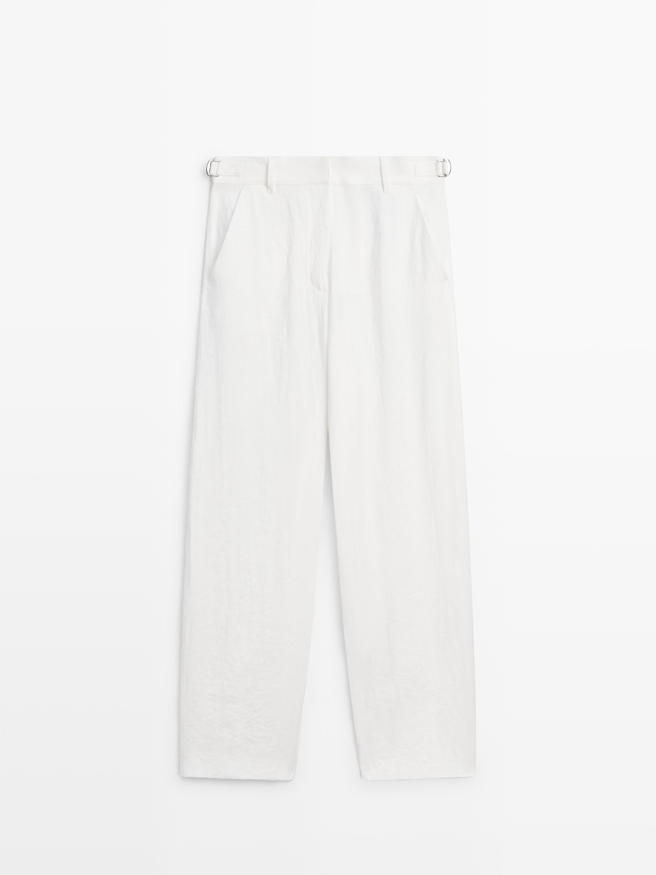 Flowing trousers with buckles